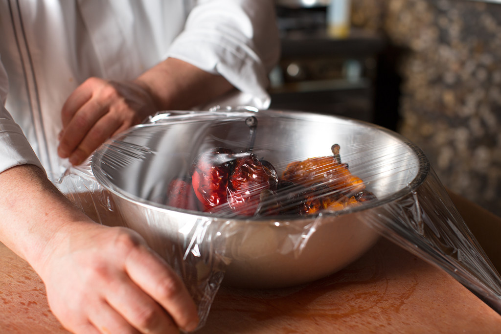 Covering the pepper bowl with a cling-wrap contains steam, and makes peeling easier!